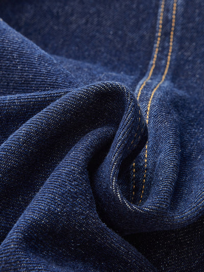 Jean taille moyenne à jambes larges et boutons sur le devant